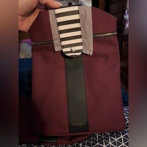 Henri Bendel Back pack and makeup bag .  Burgundy and Black